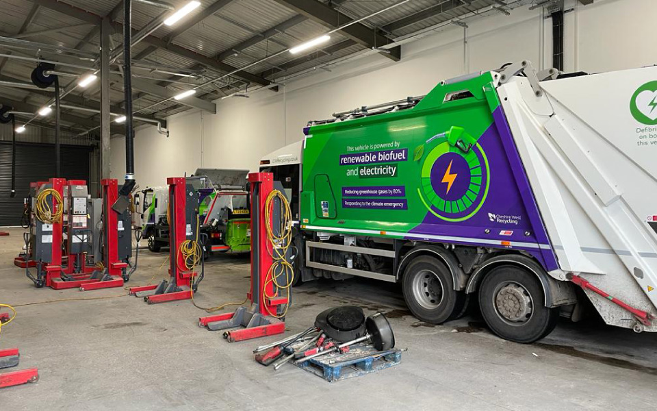 Photo of installation including mobile column lifts, and ancillary systems including LEV fume extraction