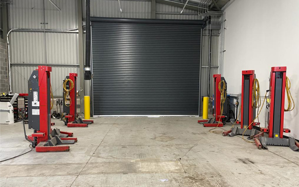 Photo of installation which includes mobile column lifts which are highly versatile, accommodating our client's RCV fleet
