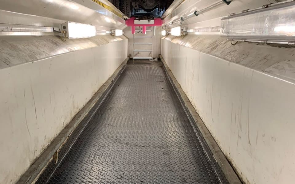 Photo shows new vehicle servicing inspection pit in situ at Adams Morey’s commercial vehicle maintenance workshop in Southampton 