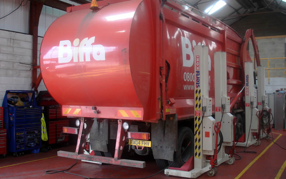 Versatile mobile column lift units, each with over 7T lift capacity, supplied and installed by CCS Garage Equipment to lift Refuse Collection Vehicles for Biffa, Tipton in West Midlands