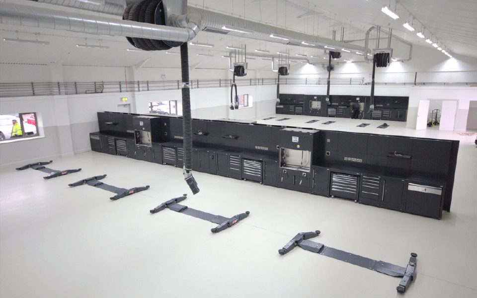 Brand new, spacious servicing workshop featuring 2-post in-ground lifts and scissor lifts installed by CCS Garage Equipment for Charles Hurst, Belfast