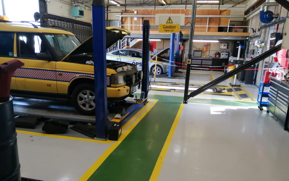 CCS Garage Equipment installed anti-slip flooring around service bays at East Midlands Airport’s vehicle maintenance workshop
