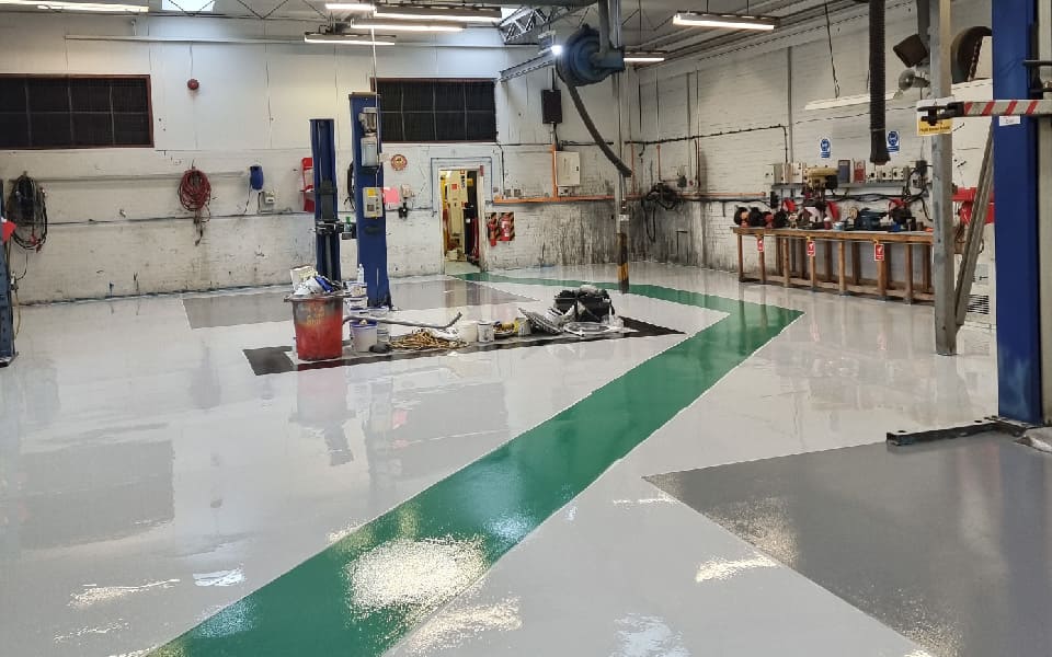 East Midlands Airport vehicle workshop floor refurbishment underway by CCS Garage Equipment