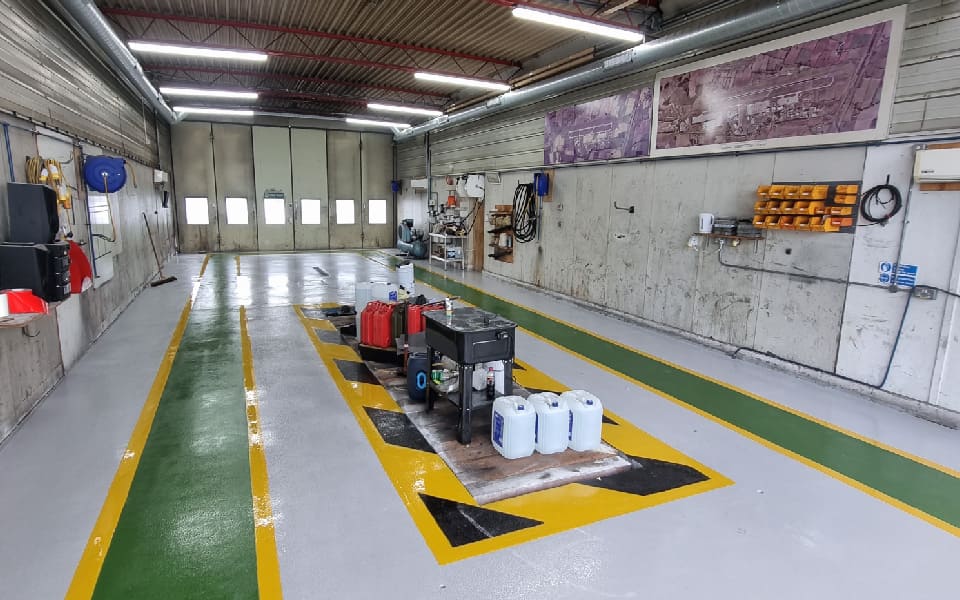 Professional, safe and more inviting floor layout which enhanced East Midlands Airport vehicle workshop’s appearance and safety features