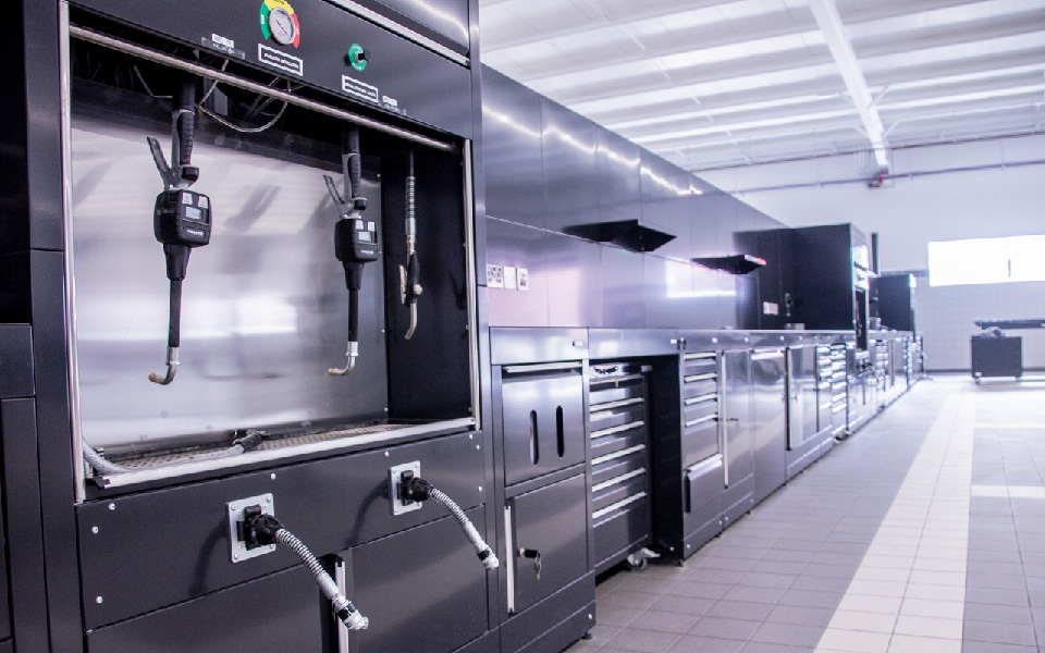 Garage equipment installation incorporating Dura workshop furniture and integrated ancillary equipment, installed at JLR in Belfast by CCS Garage Equipment