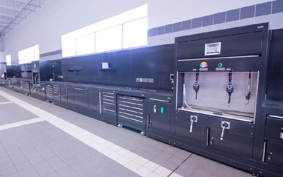 Custom Dura workshop furniture features convenient small tool storage and integral Samoa lubrication equipment, specified by CCS for Jaguar Land Rover, Belfast