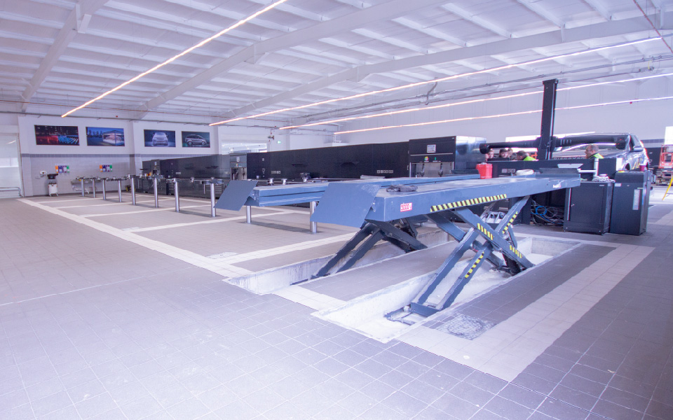 Recessed vehicle scissor lifts and Hunter wheel alignment technology installed by CCS Garage Equipment for Jaguar Land Rover, Belfast in Northern Ireland