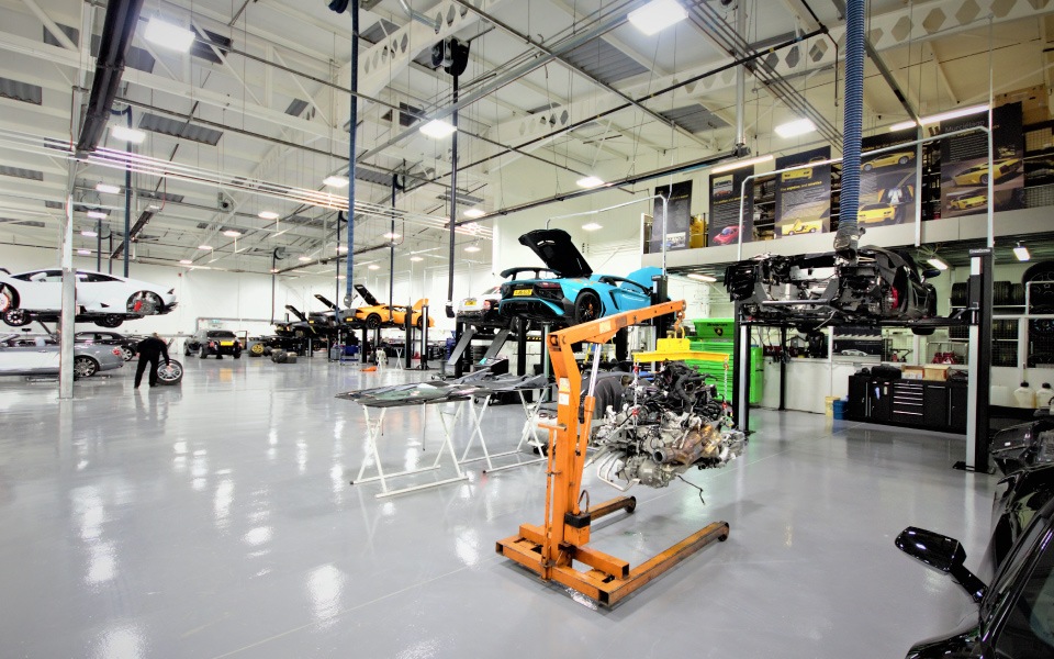 Spacious vehicle servicing workshop featuring 2-post Nussbaum Smart Lifts installed by CCS Garage Equipment at Lamborghini in London