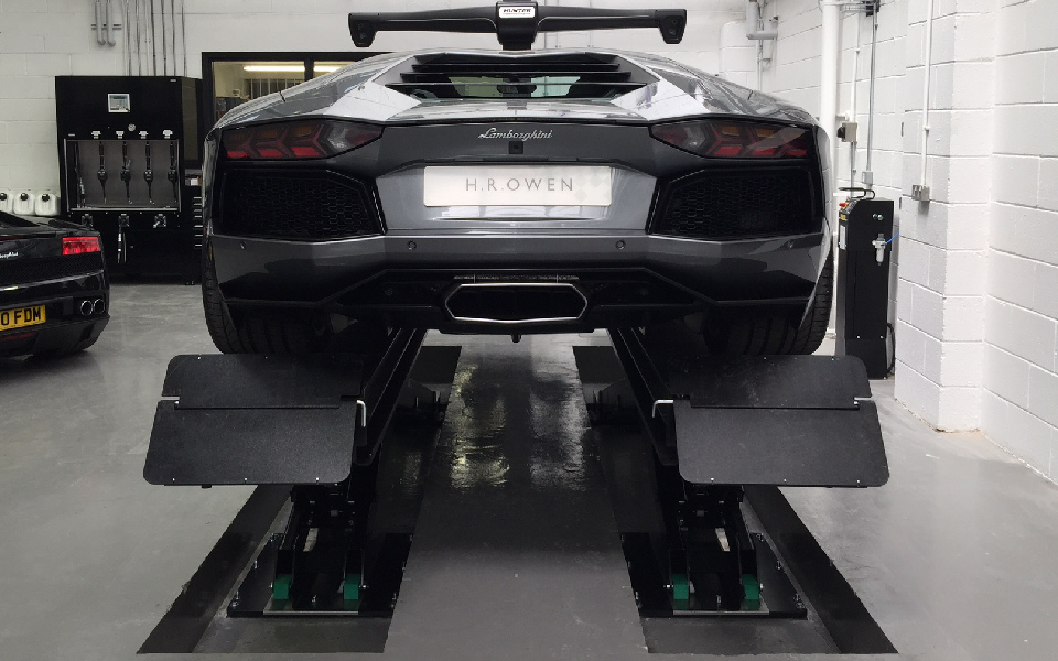 Nussbaum scissor lift recessed for flat vehicle entry and exit, installed by CCS Garage Equipment for Lamborghini’s dealership in Stockport