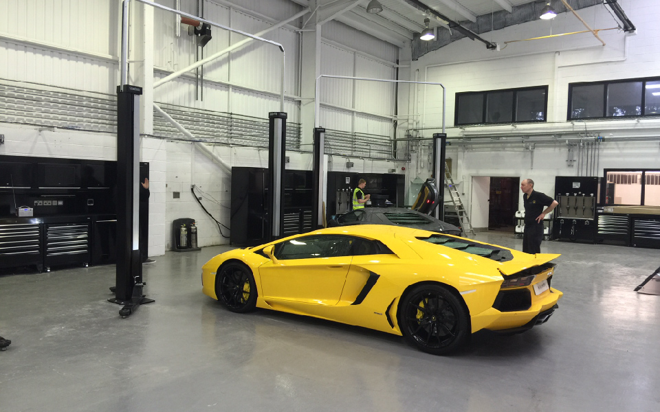 Bespoke Dura workshop furniture featuring integrated compressed air, lubrication, power and data supply creates practical working spaces in this dealership workshop