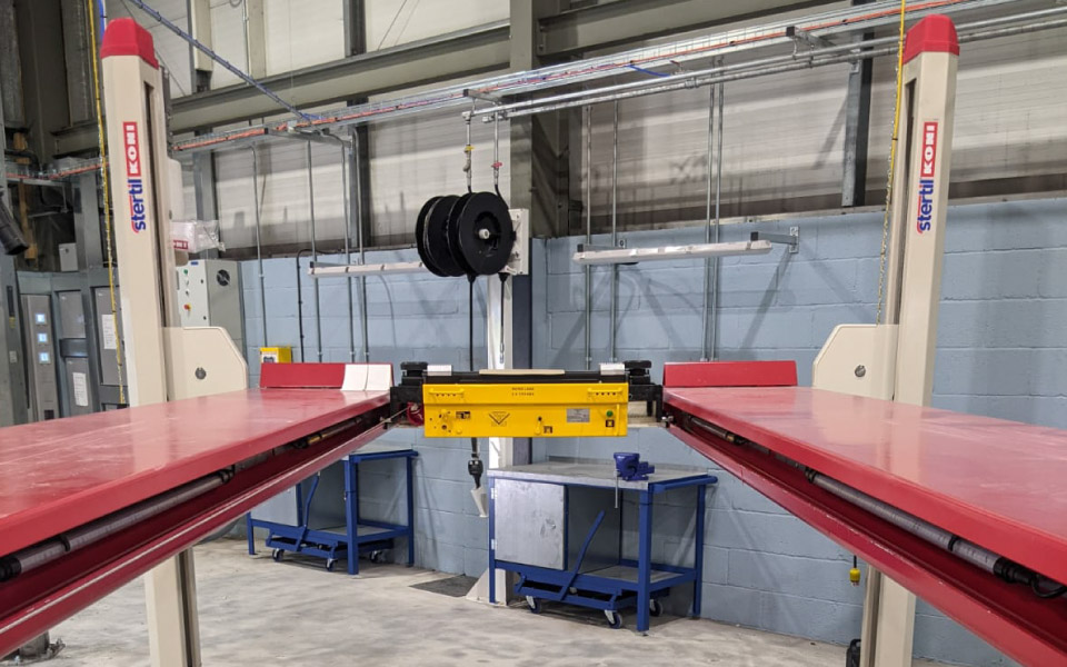 Commercial vehicle lift and vehicle lift-mounted jacking beam installed as part of CCS' garage equipment installation for South Western Ambulance Service