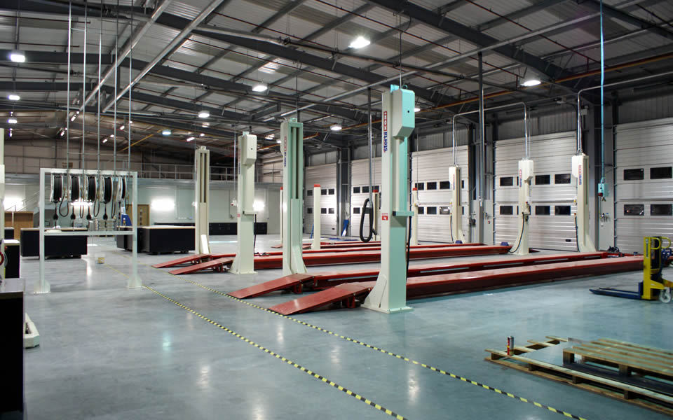 Heavy-duty 4-post vehicle lift & garage equipment installation by CCS Garage Equipment
