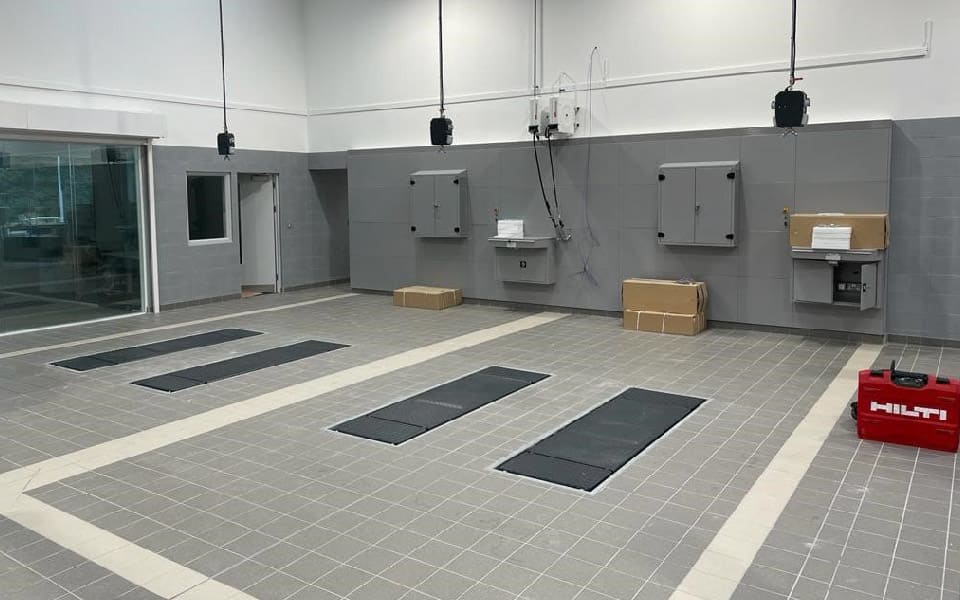 Newly installed workshop bays and in-ground scissor lifts